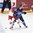 PARIS, FRANCE - MAY 8: Finland's Sebastian Aho #20 bodychecks Czech Republic's Jakub Krejcik #36 during preliminary round action at the 2017 IIHF Ice Hockey World Championship. (Photo by Matt Zambonin/HHOF-IIHF Images)